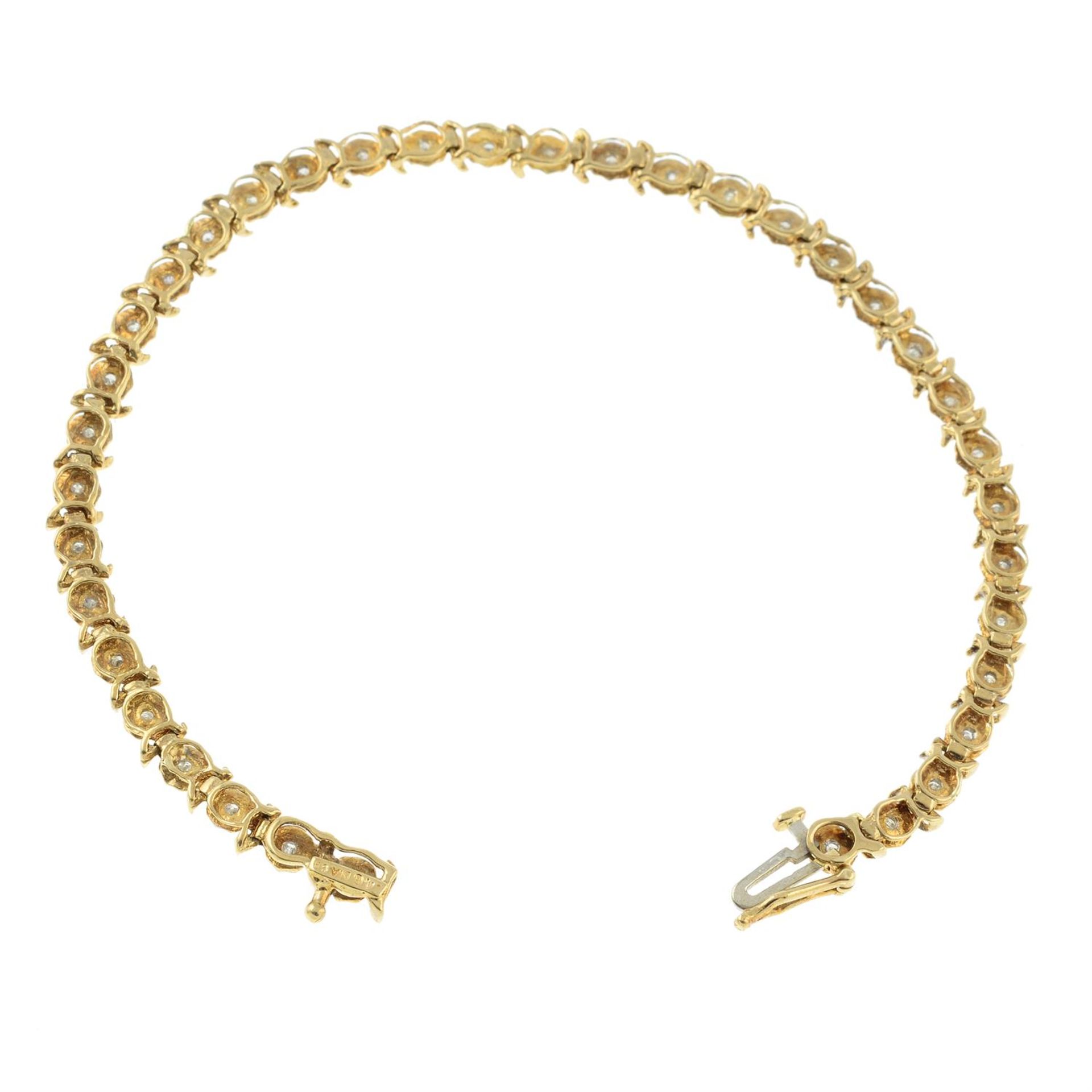 A 9ct gold illusion-set diamond line bracelet. - Image 2 of 2