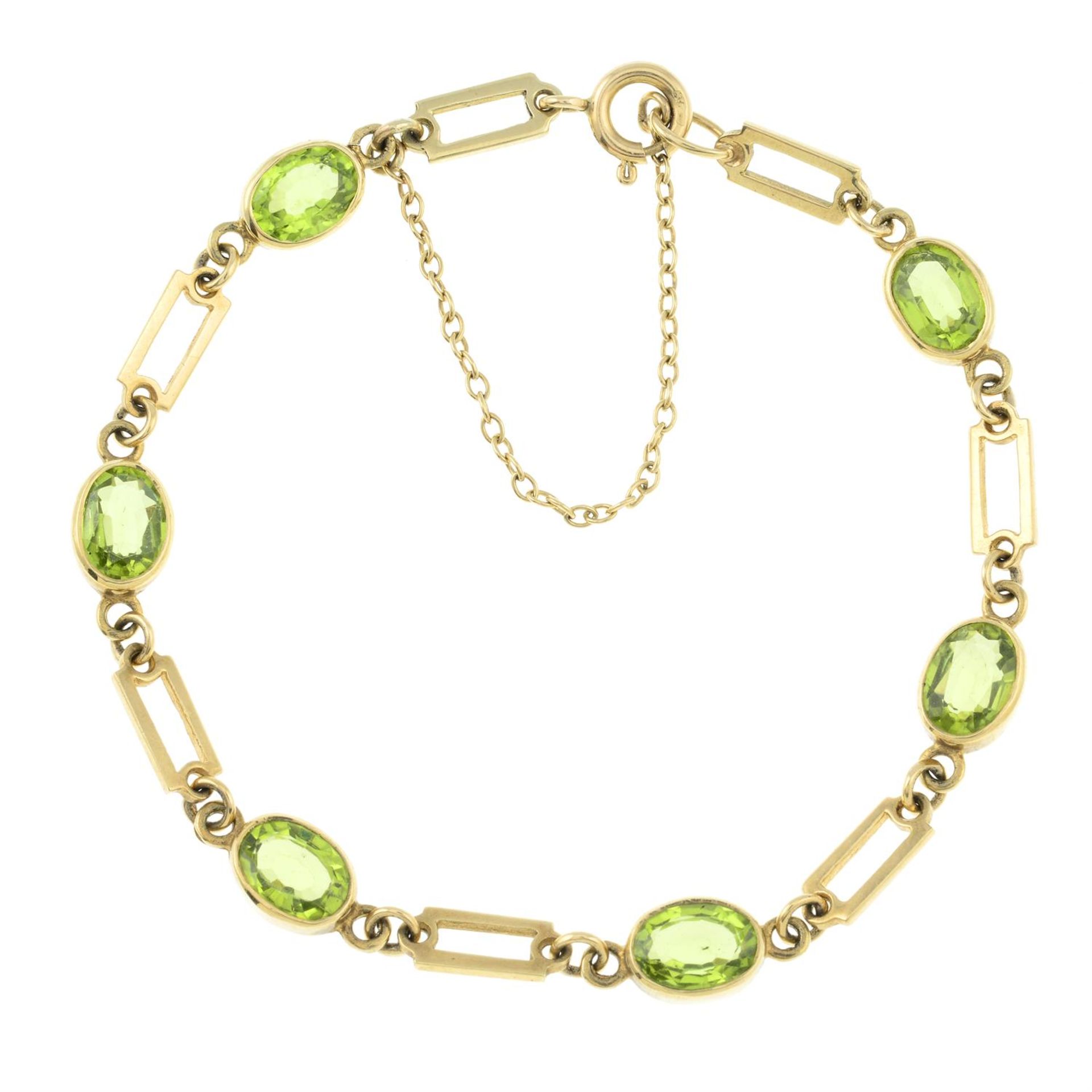 A 9ct gold peridot bracelet.