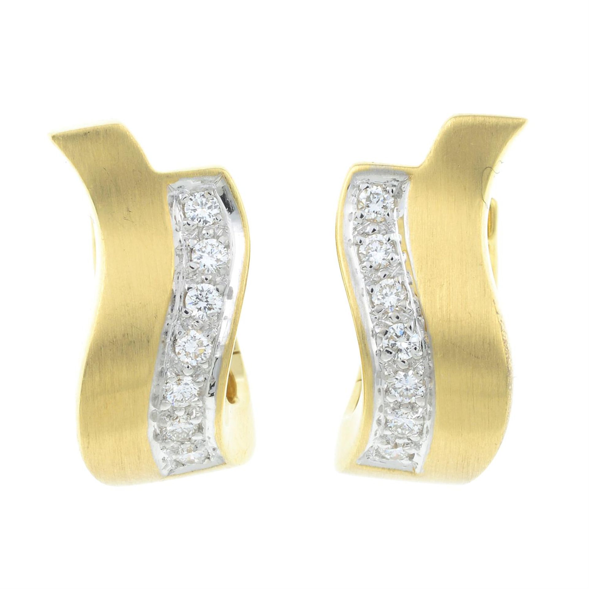 A pair of 18ct gold diamond hoop earrings.