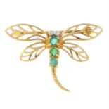 An emerald and diamond dragonfly brooch, with openwork wings.