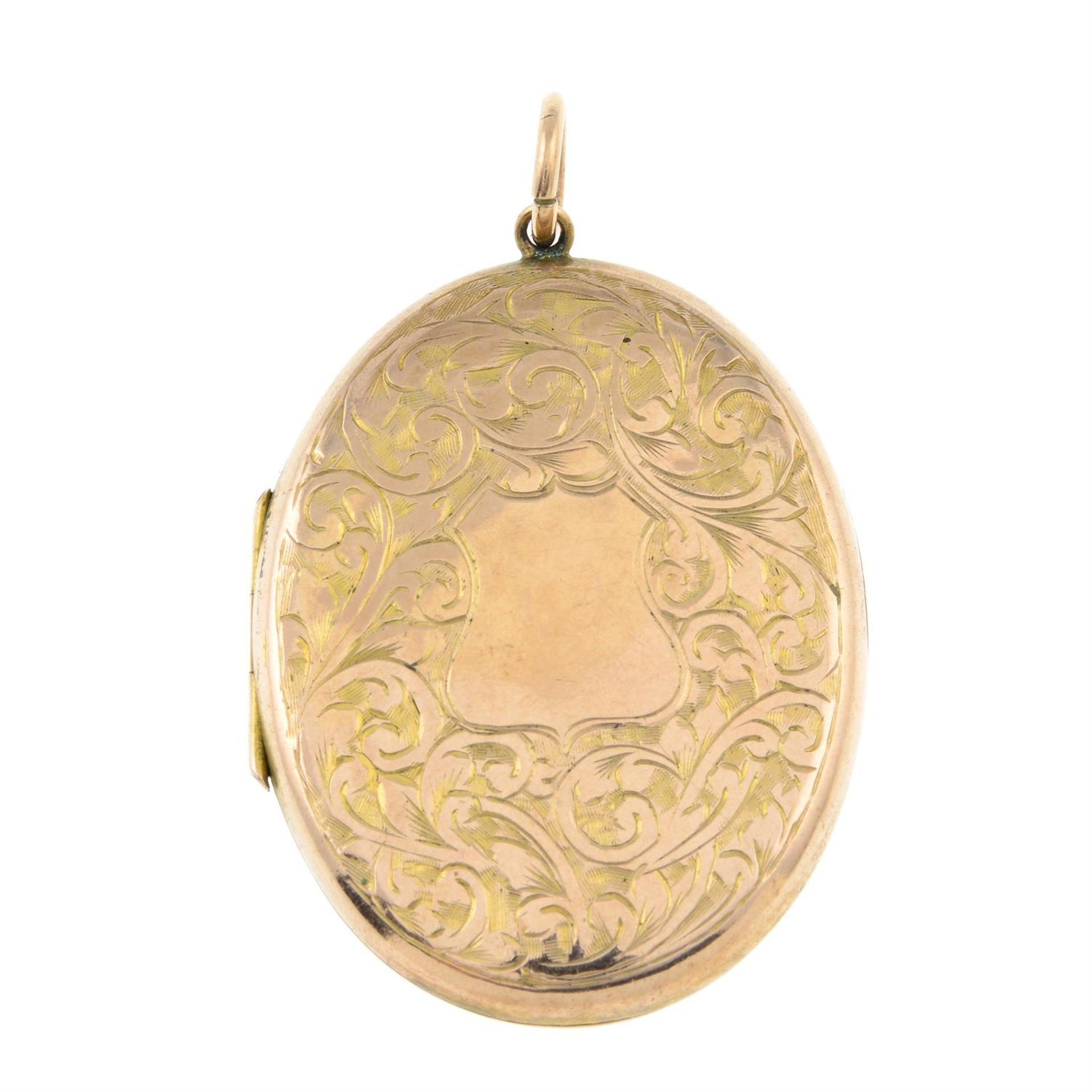 An early 20th century 9ct gold front&back engraved foliate locket.