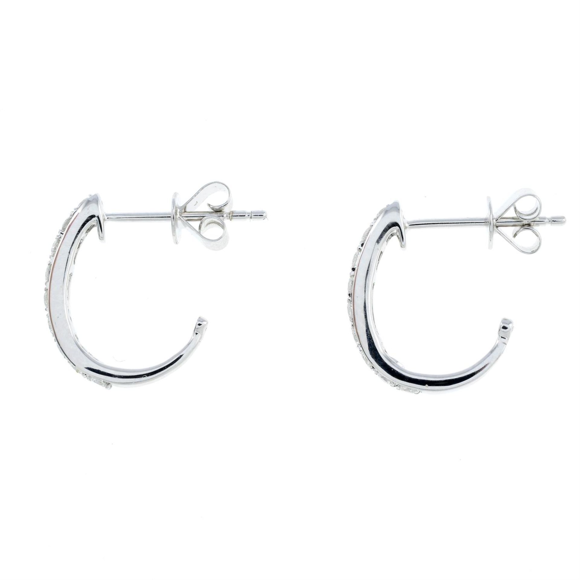 A pair of diamond hoop earrings. - Image 2 of 2