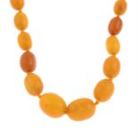 An amber single-strand necklace.