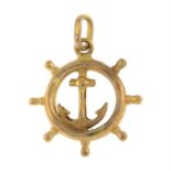 A mid 20th century nautical wheel pendant, with central anchor detail.