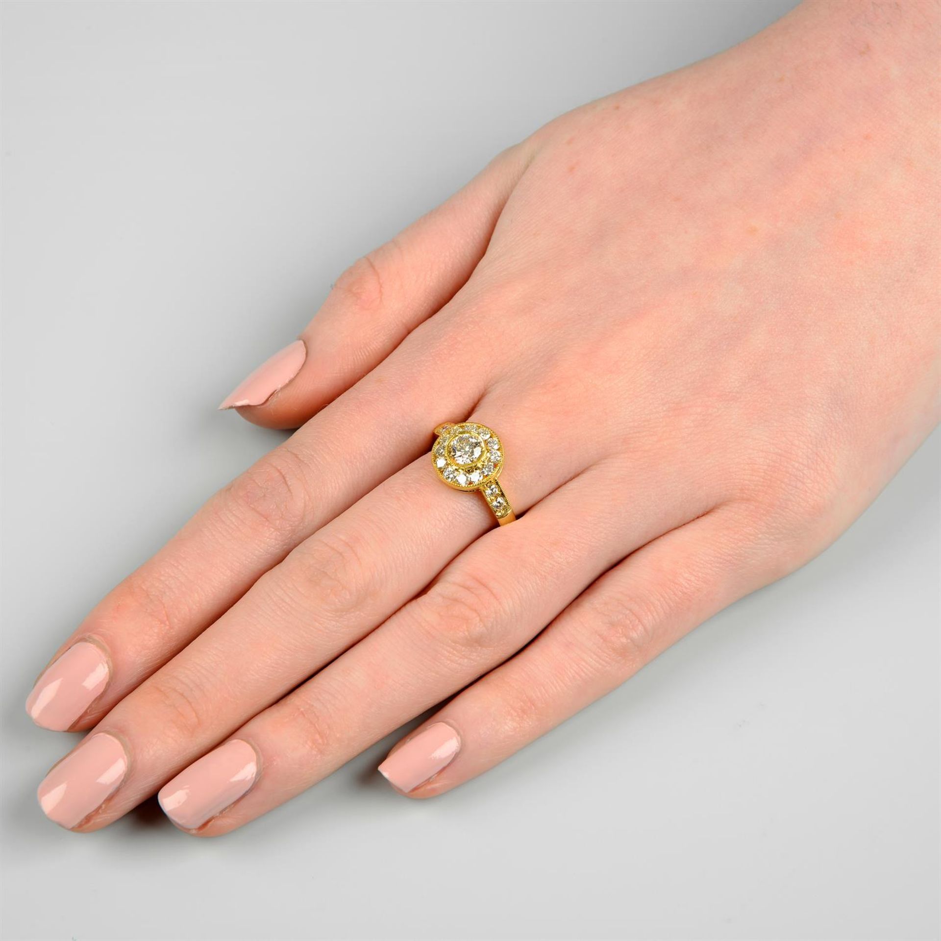 A brilliant-cut diamond cluster ring. - Image 6 of 6