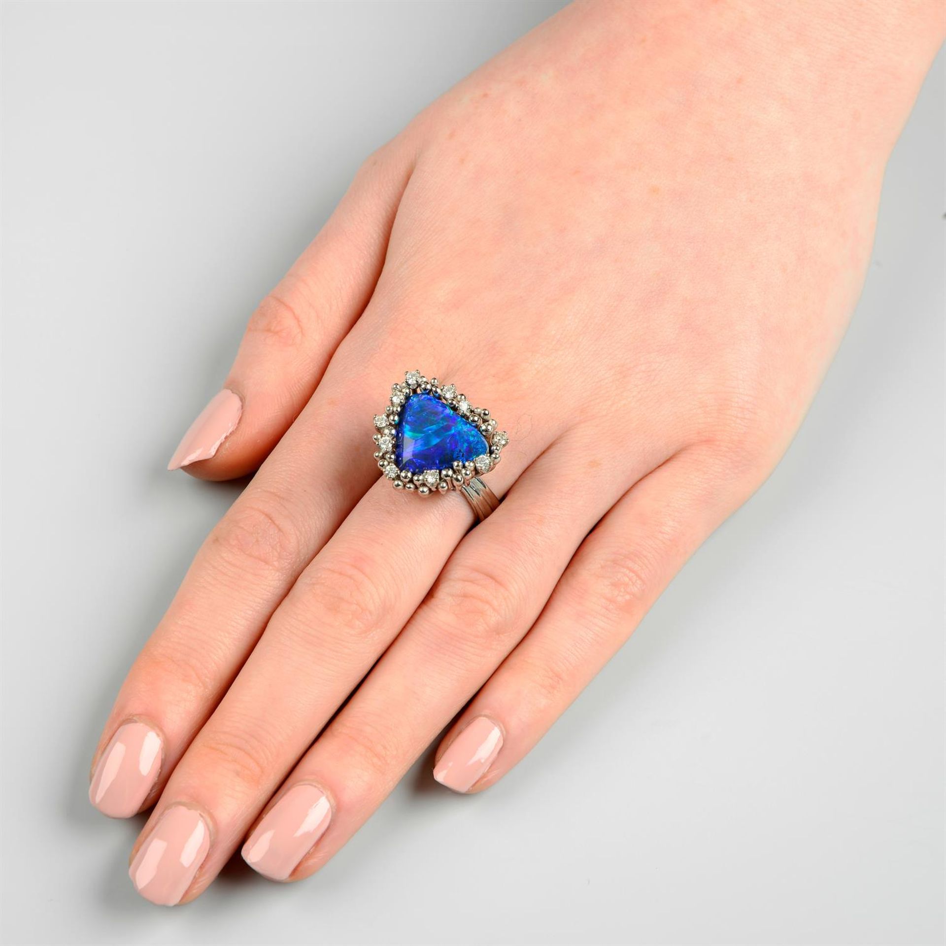 A boulder opal ring, with brilliant-cut diamond and bead surround, by Grima. - Bild 6 aus 6