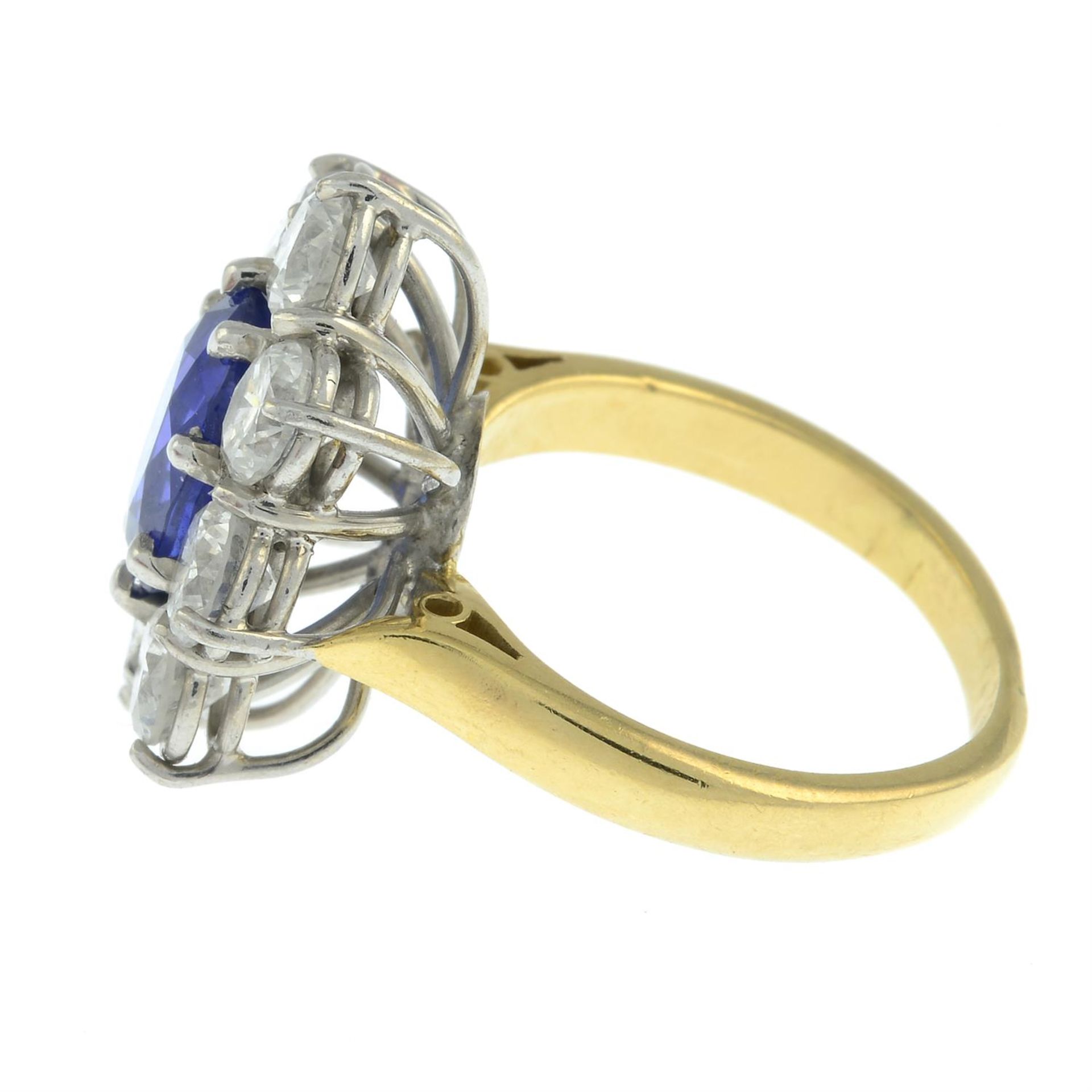 A sapphire and brilliant-cut diamond cluster ring. - Image 3 of 5