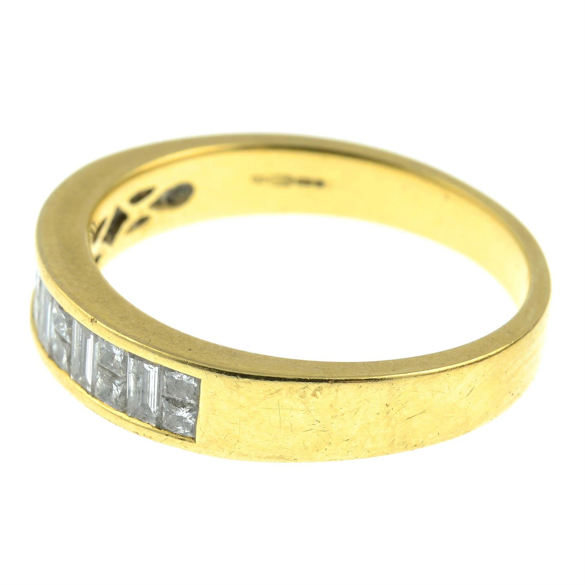 An 18ct gold baguette-cut and square-shape diamond half-eternity ring. - Image 3 of 6