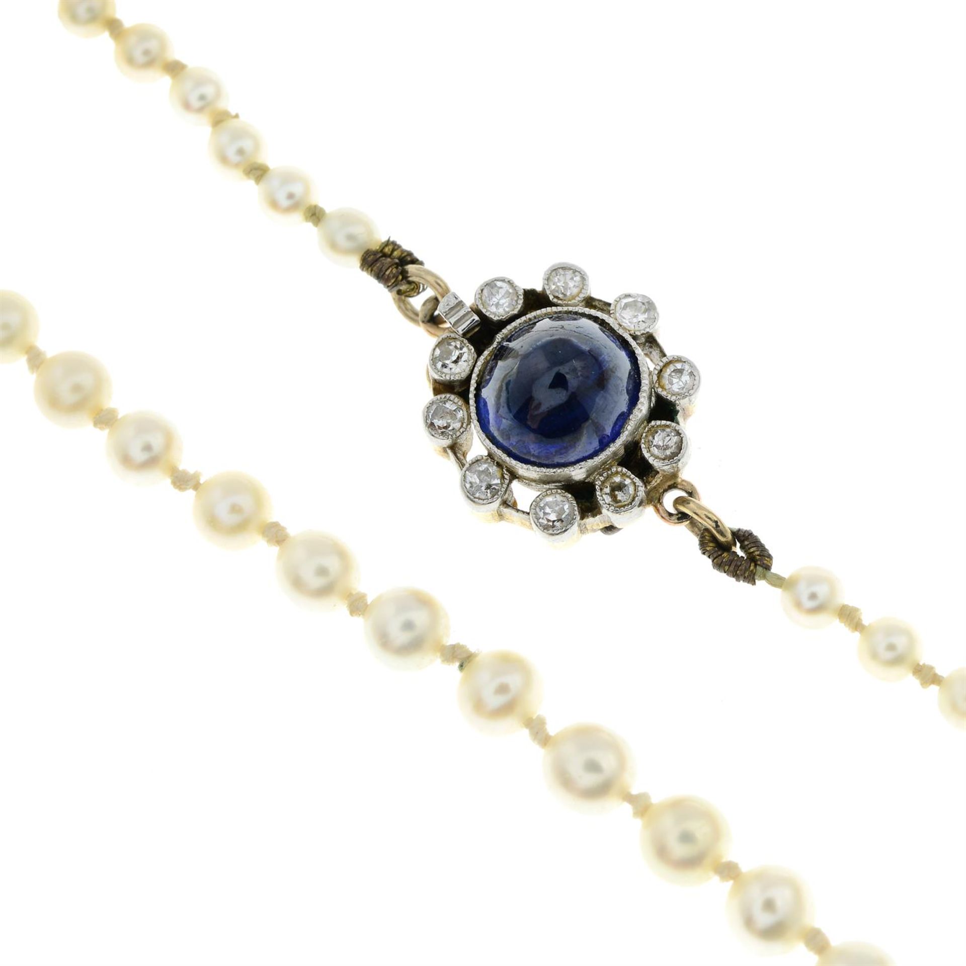 An early 20th century graduated pearl single-strand necklace, with sapphire cabochon and single-cut - Image 4 of 5