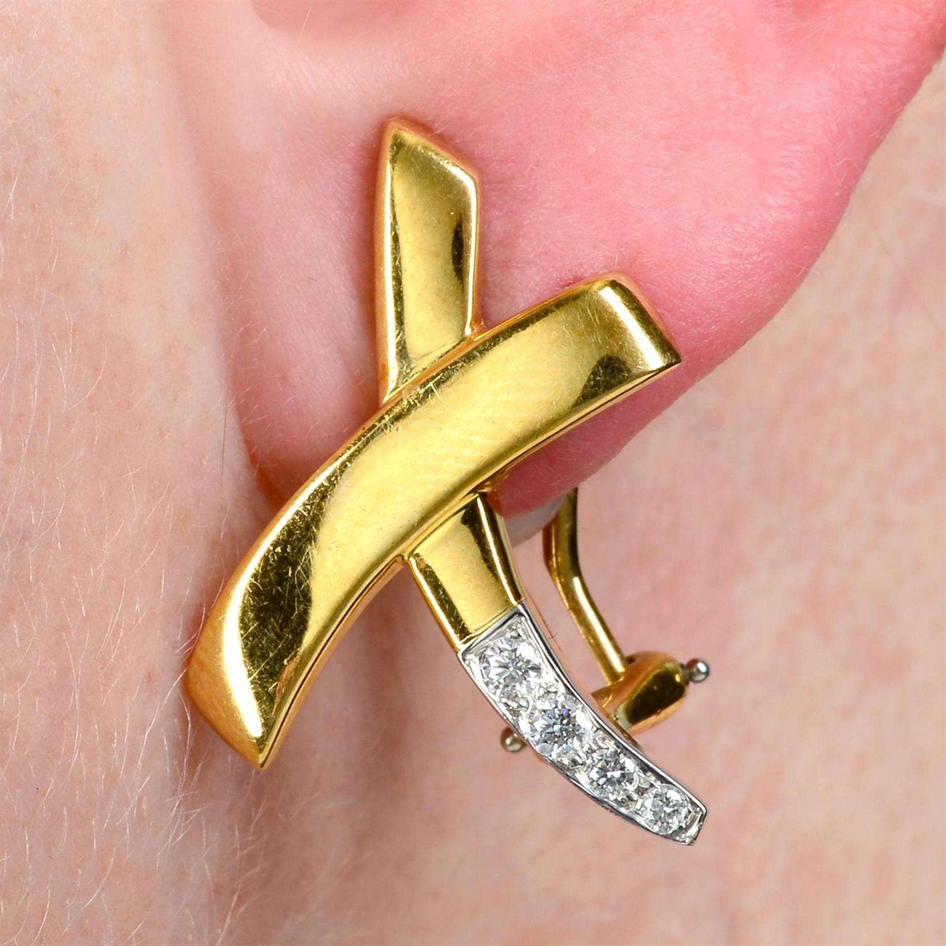 A pair of brilliant-cut diamond 'Kiss' earrings, by Paloma Picasso, for Tiffany & Co.