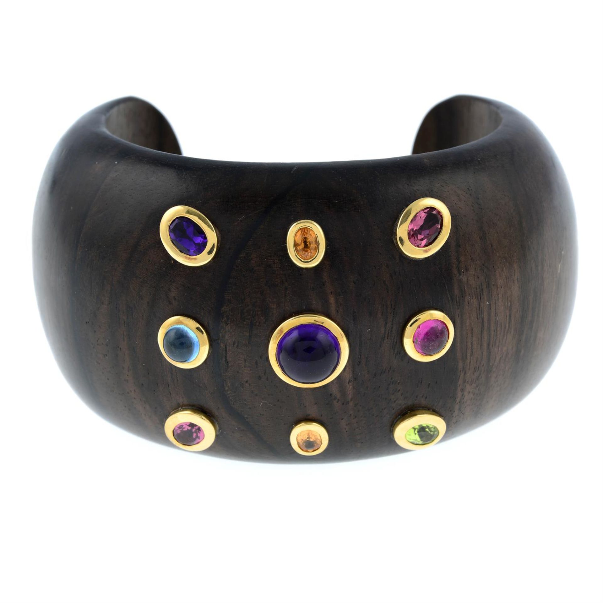 A jacaranda cuff bangle set with amethyst, blue and orange topaz, pink tourmaline and peridot. - Image 2 of 4