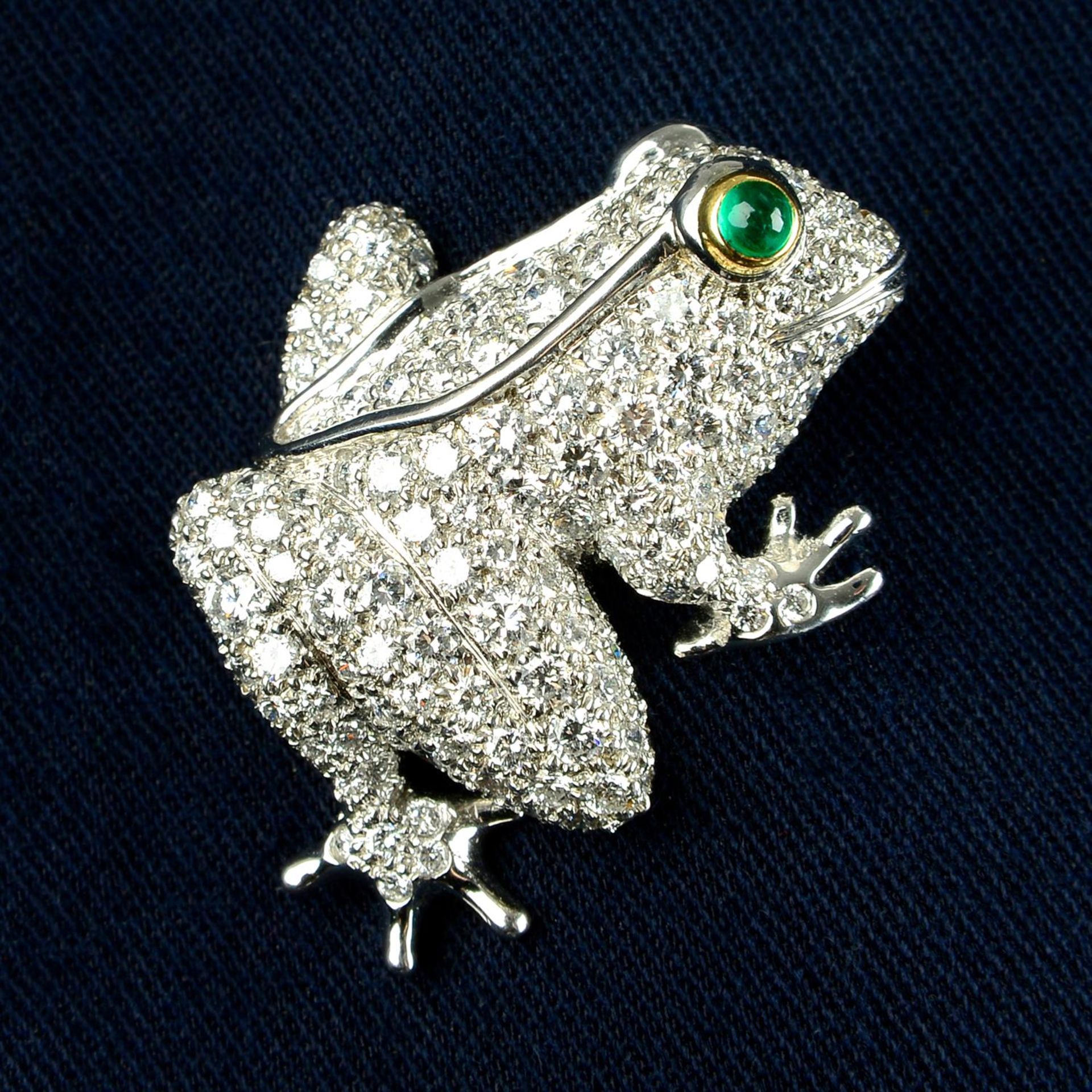 A platinum pavé-set diamond frog brooch, with emerald cabochon eye, by Tiffany & Co.