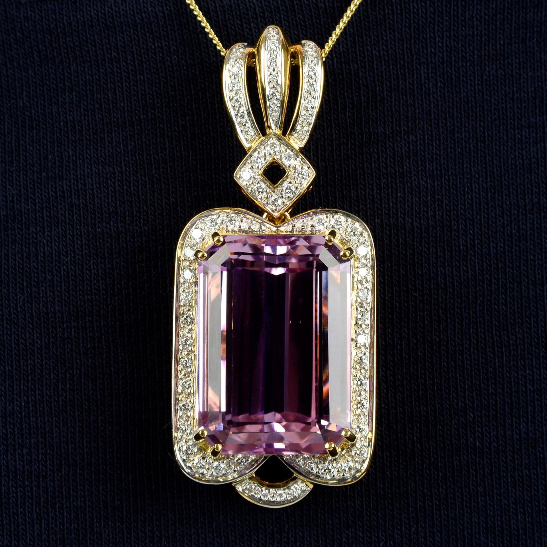 An 18ct gold kunzite and diamond pendant.
