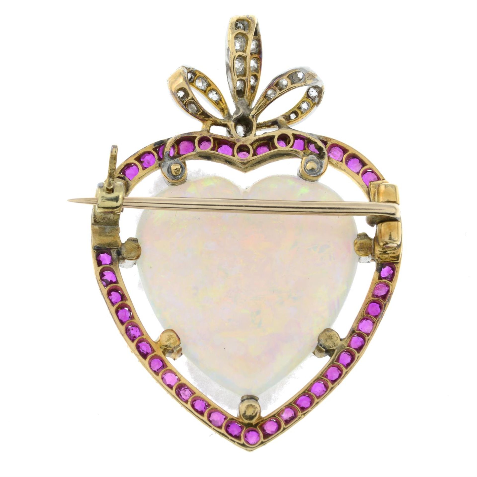 An Edwardian platinum and 18ct gold opal heart cabochon, ruby and diamond bow brooch. - Image 3 of 4