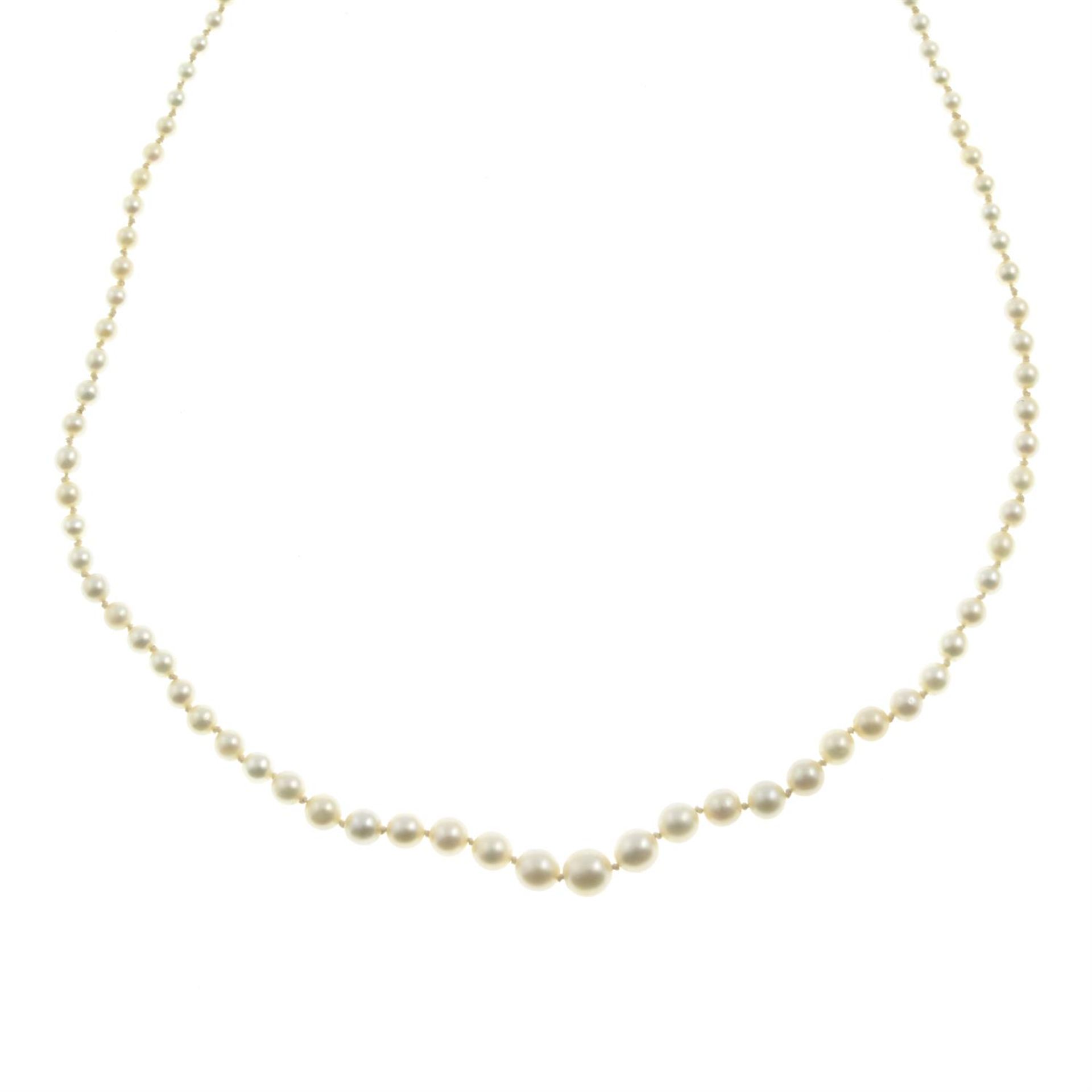 An early 20th century graduated pearl single-strand necklace, with sapphire cabochon and single-cut - Image 2 of 5