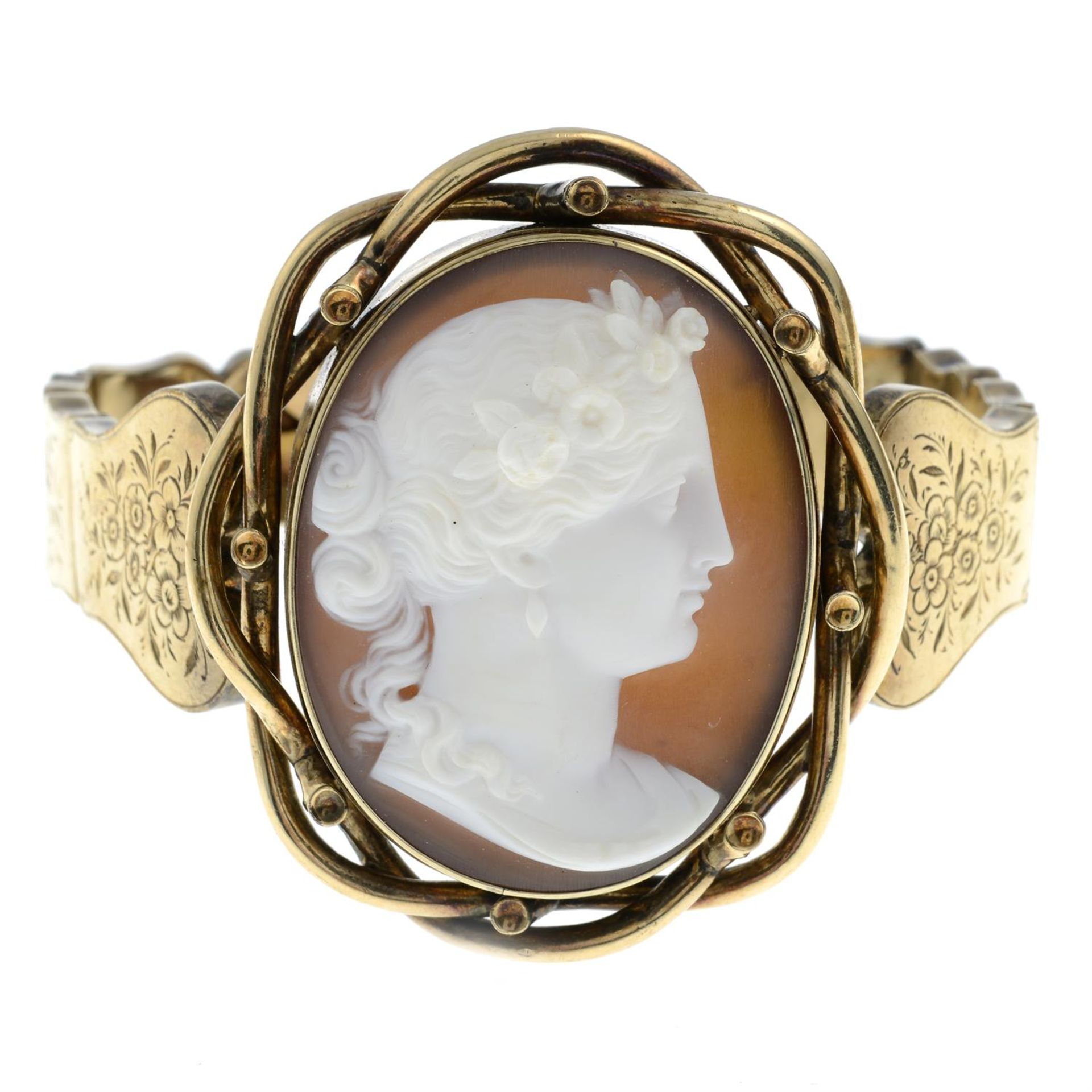 A late 19th century gold shell cameo bracelet, depicting Flora, with floral engraved sides. - Image 2 of 3