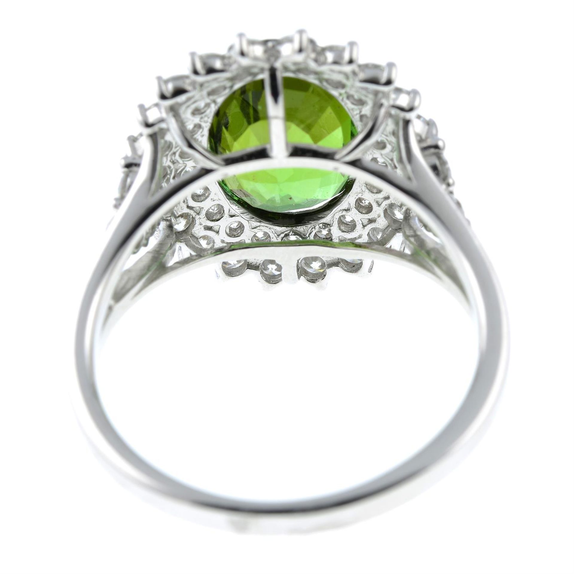 A green tourmaline ring, with brilliant-cut diamond surrounds and shoulders. - Image 4 of 6