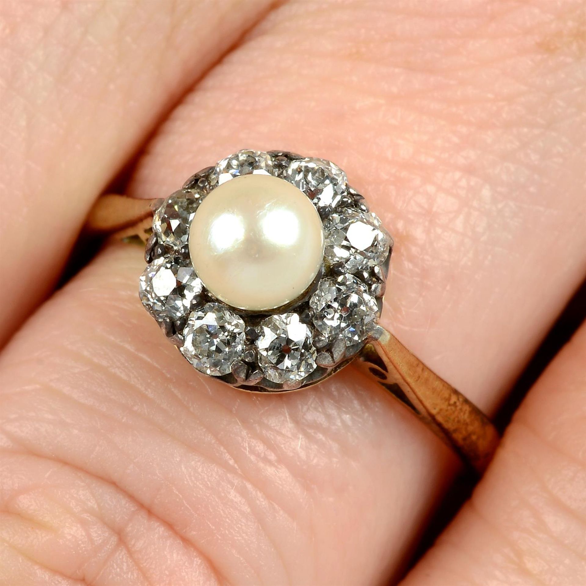 A late Victorian silver and gold pearl and old-cut diamond cluster ring.