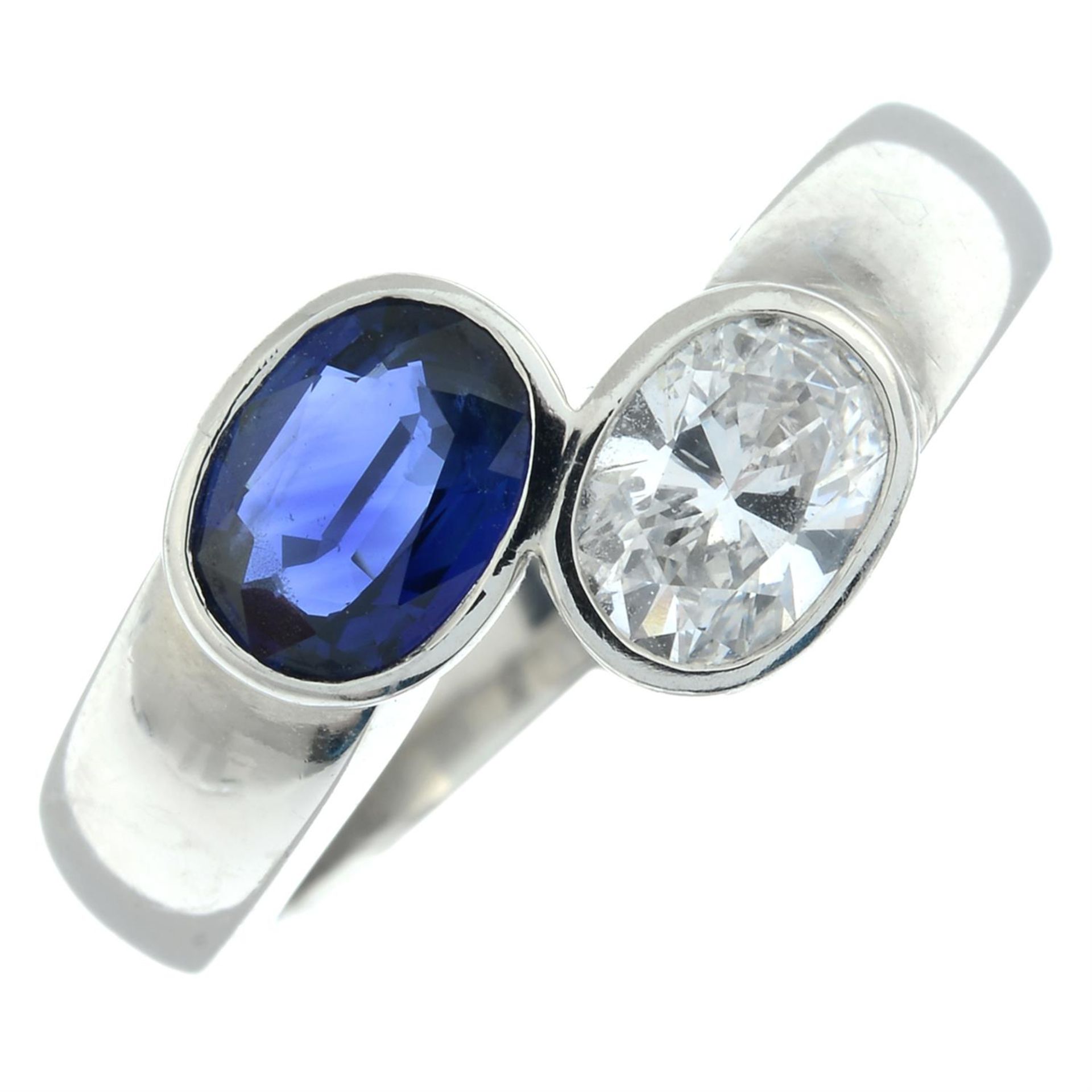 A platinum, oval-shape diamond and sapphire 'Toi et Moi' crossover ring. - Bild 2 aus 6