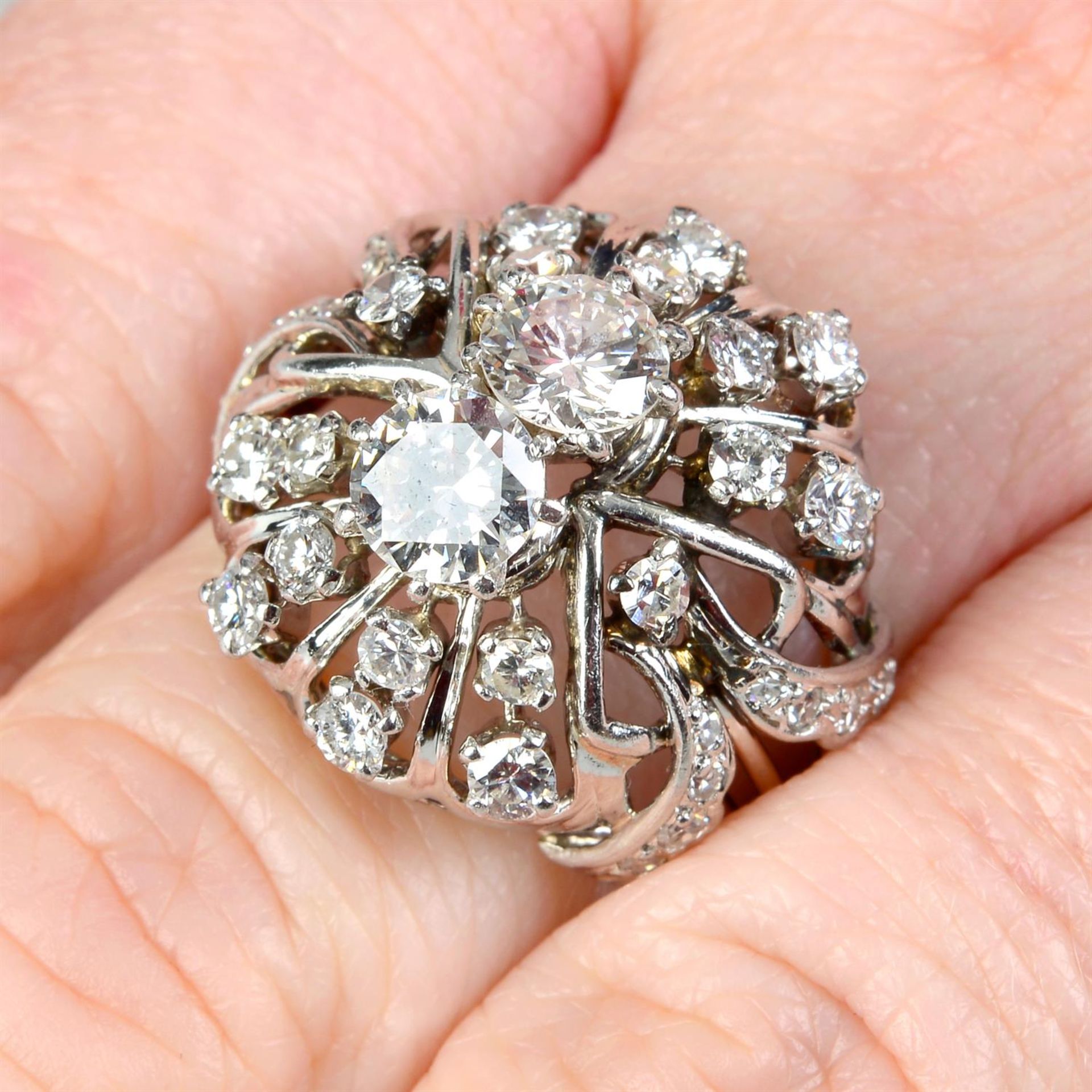 A mid 20th century platinum brilliant and single-cut diamond dress ring.