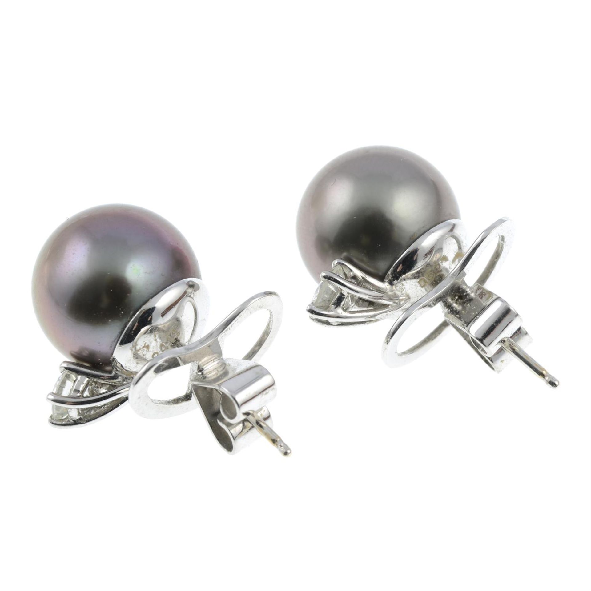 A pair of brilliant-cut diamond highlight 'Tahitian' cultured pearl stud earrings. - Image 3 of 3