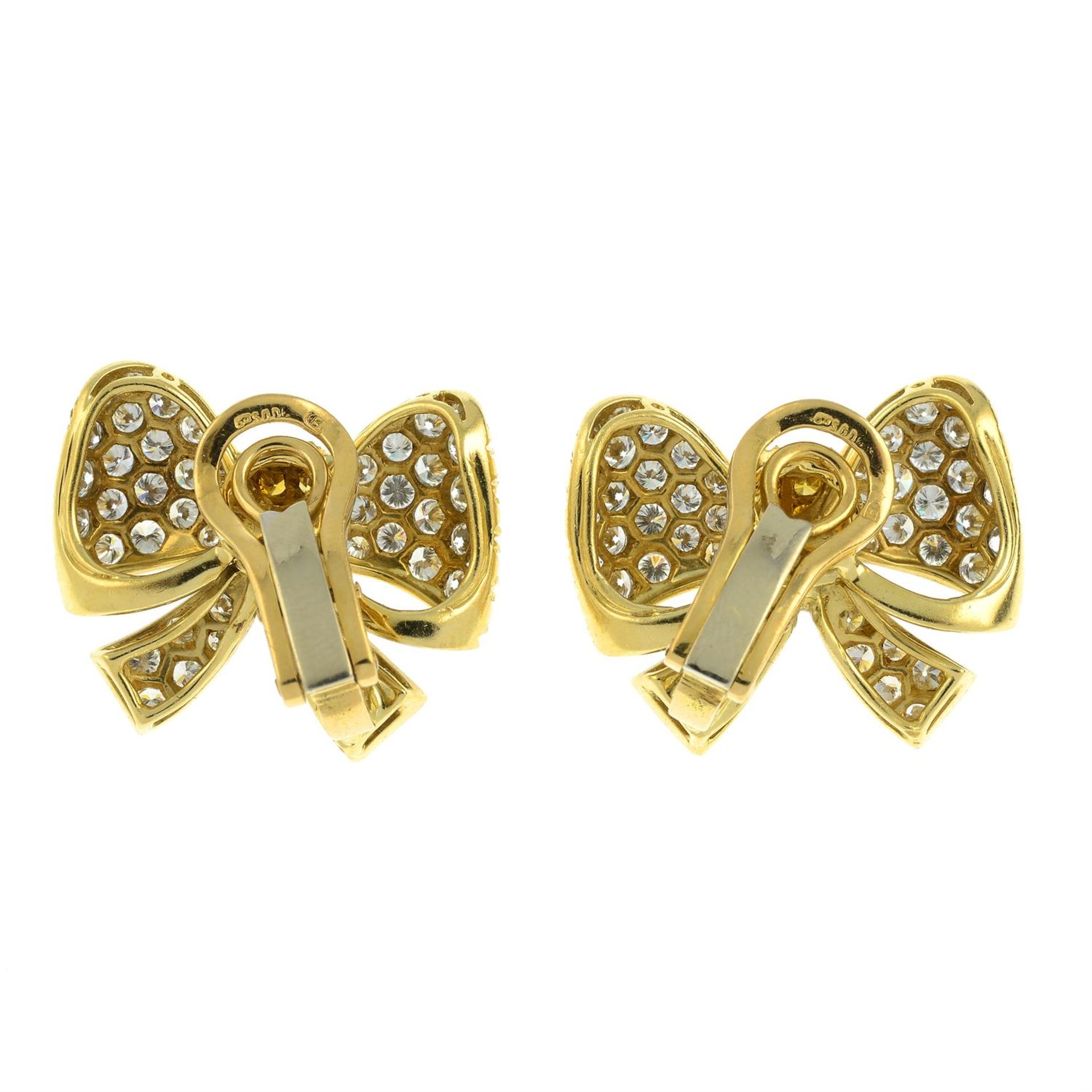 A pair of pavé-set 'yellow' diamond and diamond bow earrings. - Image 3 of 3
