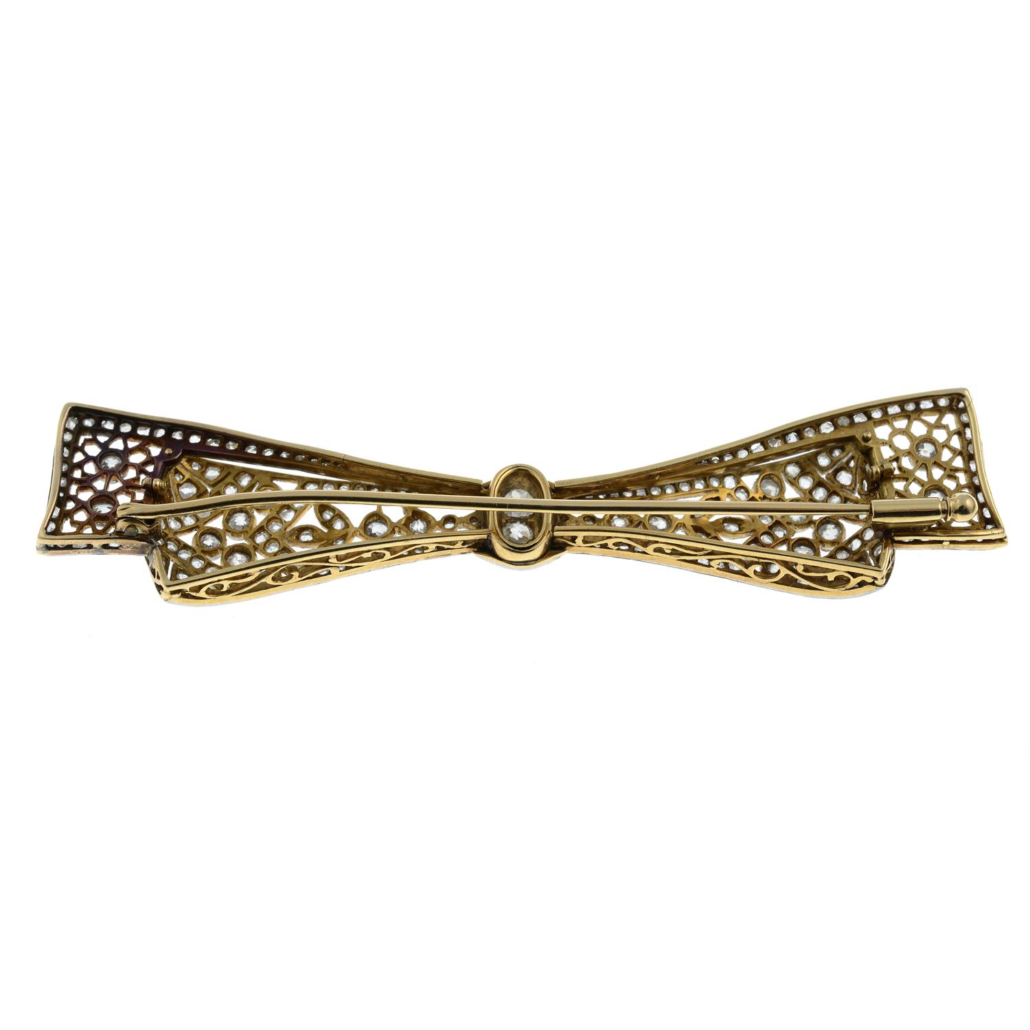 An early 20th century platinum and 18ct gold, old and rose-cut diamond openwork bow brooch. - Image 3 of 4