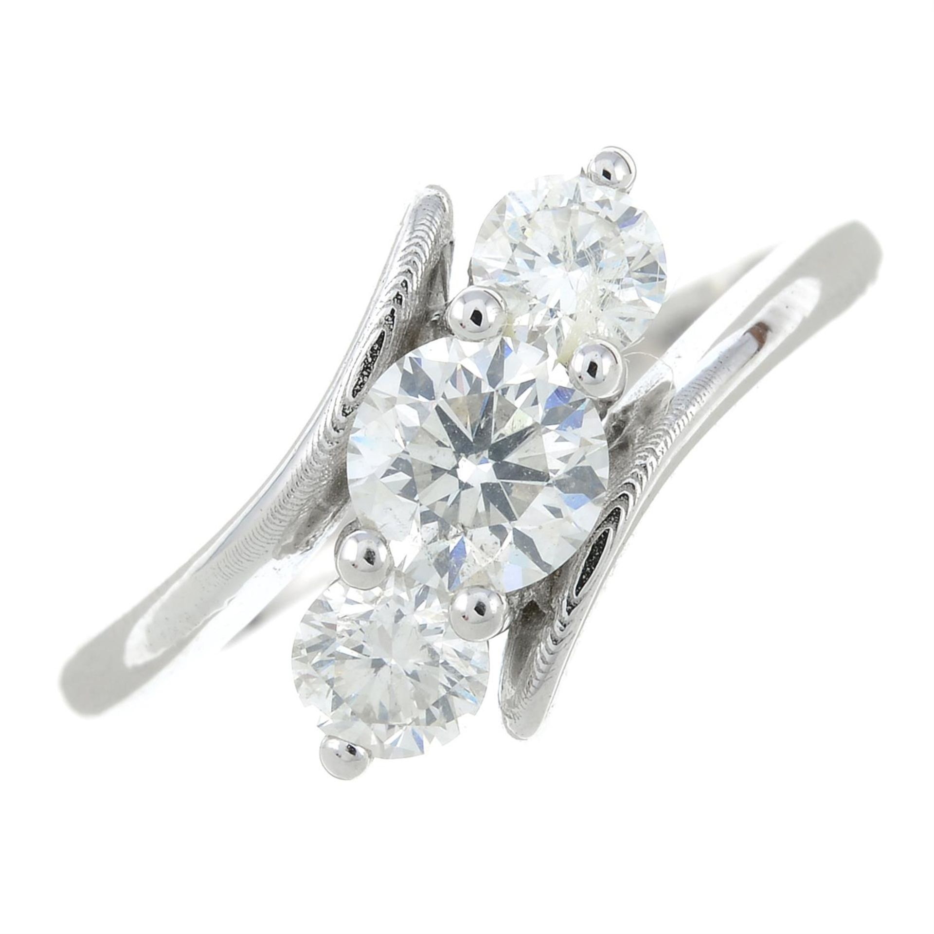 A graduated brilliant-cut diamond three-stone ring, with asymmetric sides. - Bild 2 aus 6