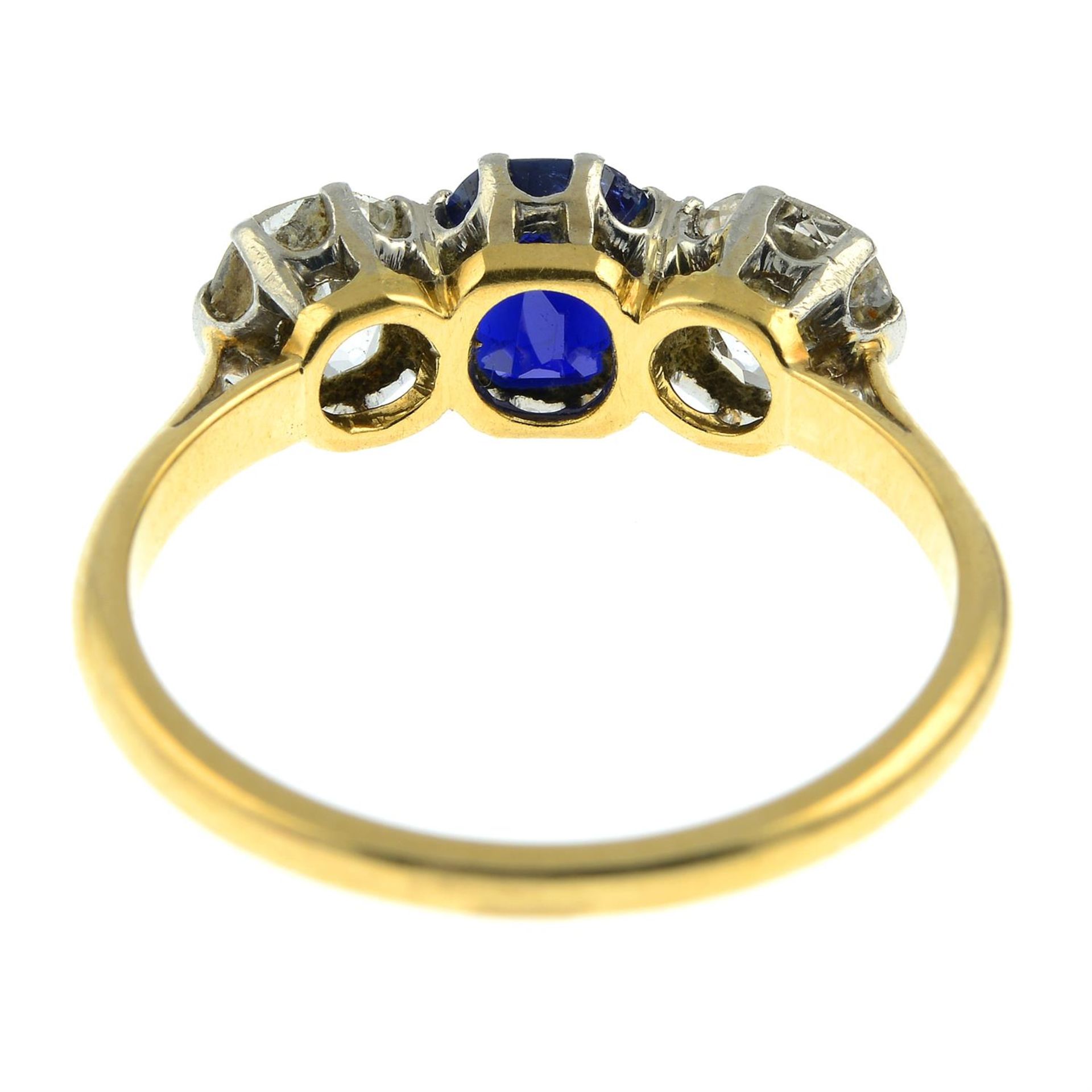 An early 20th century 18ct gold sapphire and old-cut diamond three-stone ring. - Image 4 of 6