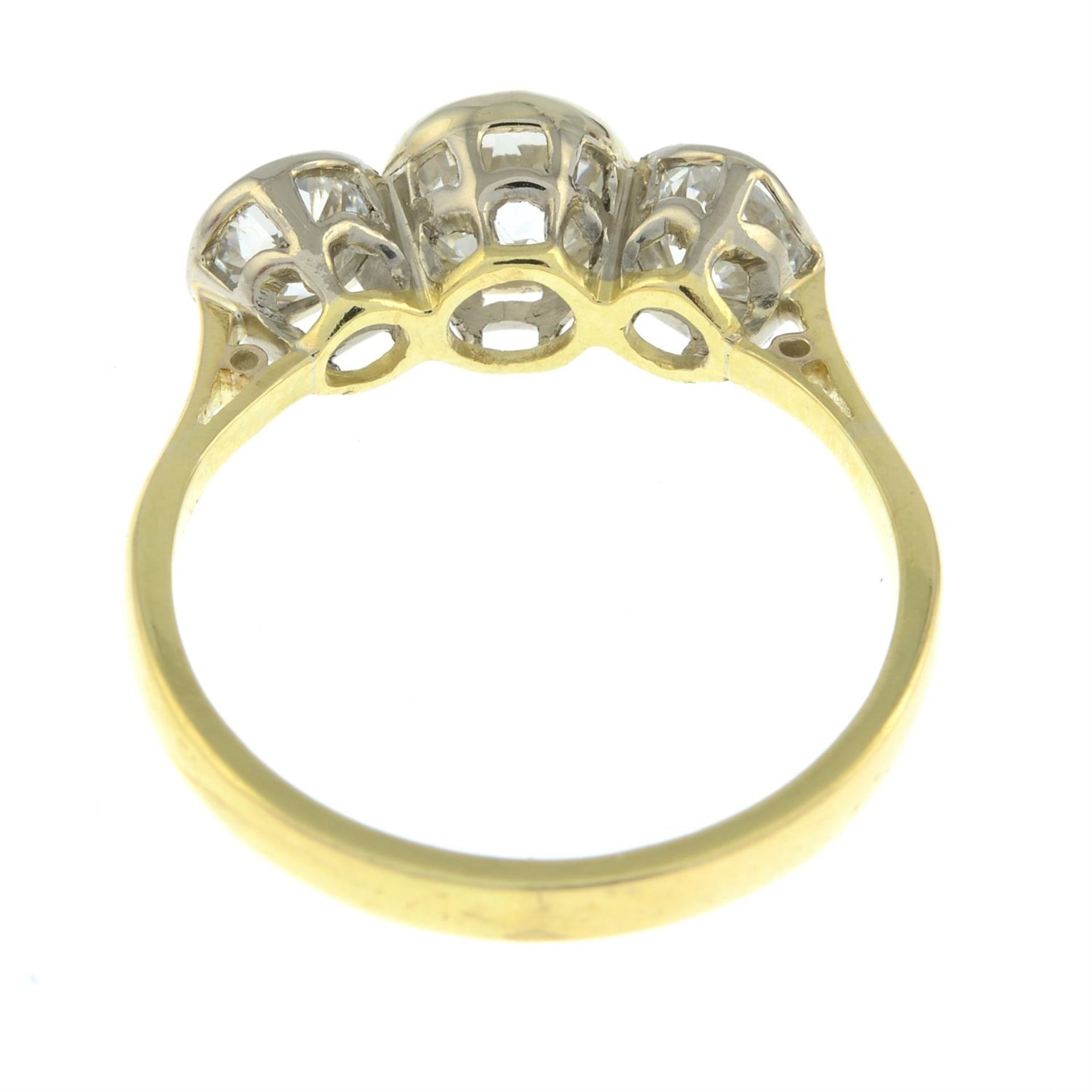 An 18ct gold graduated old-cut diamond three-stone ring. - Image 4 of 5