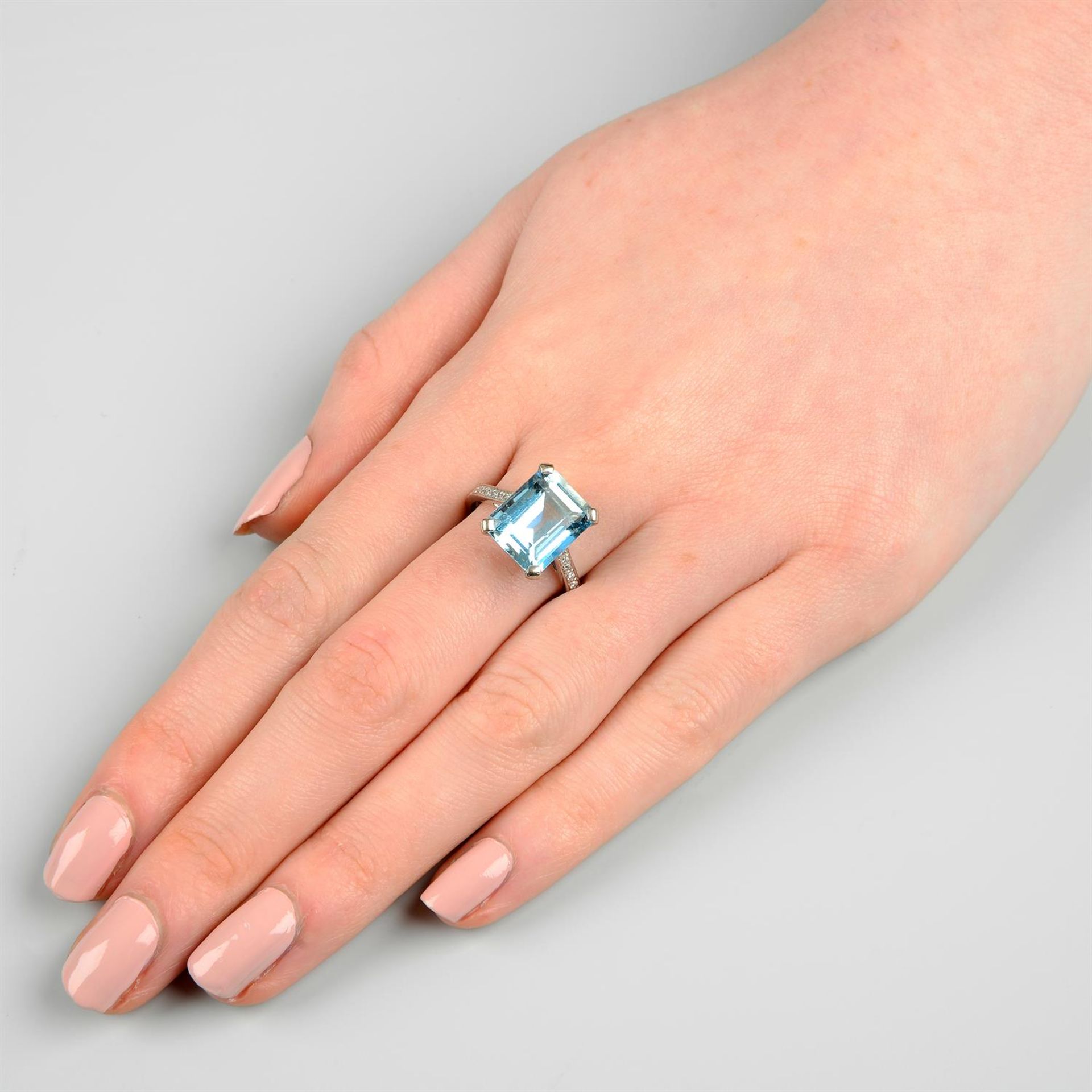 An 18ct gold aquamarine ring, with brilliant-cut diamond line shoulders. - Image 6 of 6