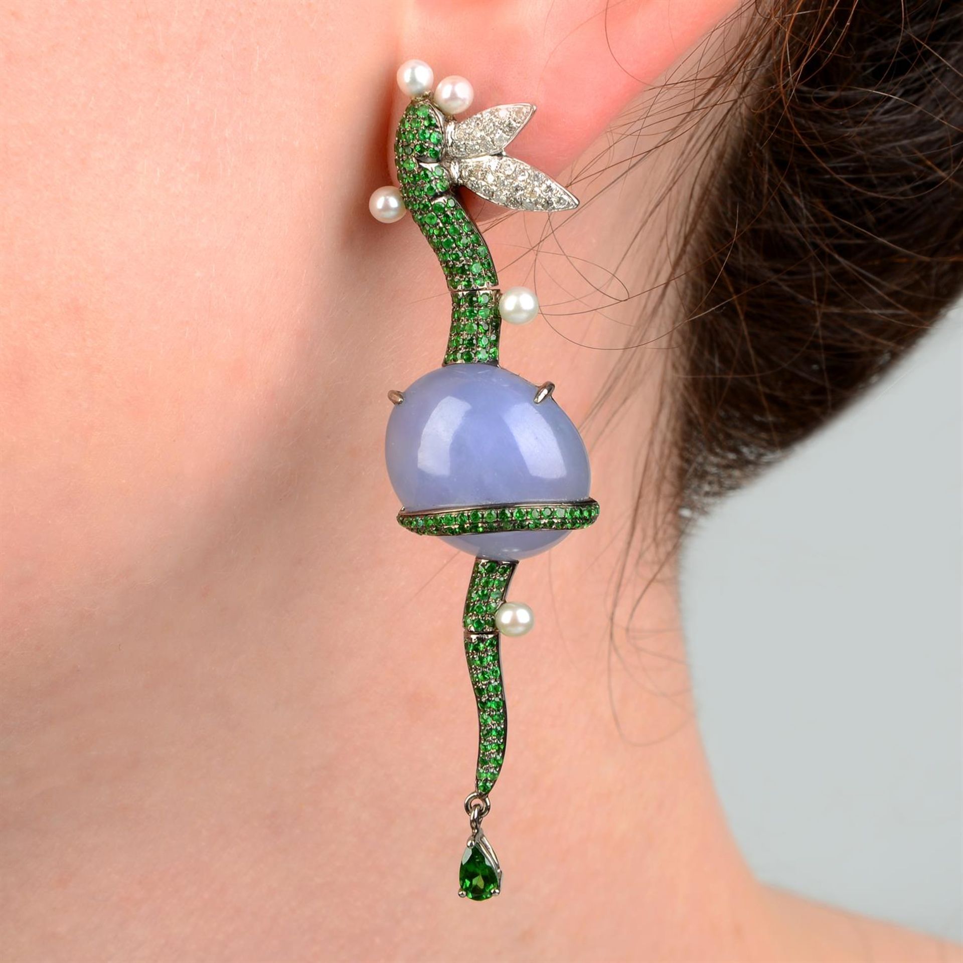 A pair of lavender jade, green garnet, diamond and seed pearl earrings, by Fei Liu.