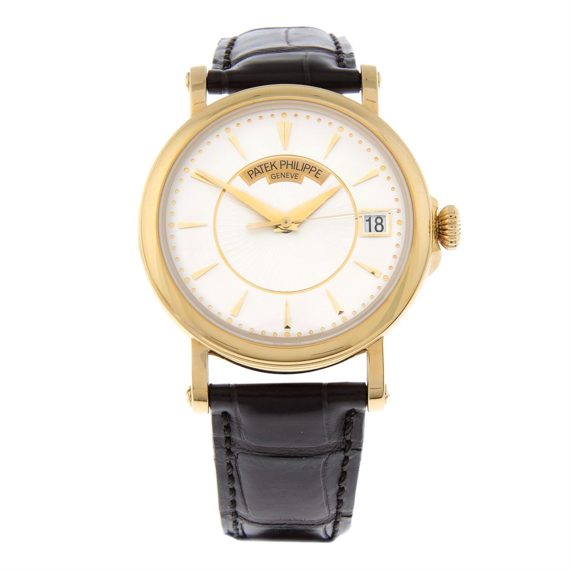 PATEK PHILIPPE - an 18ct yellow gold Calatrava wrist watch, 37mm.