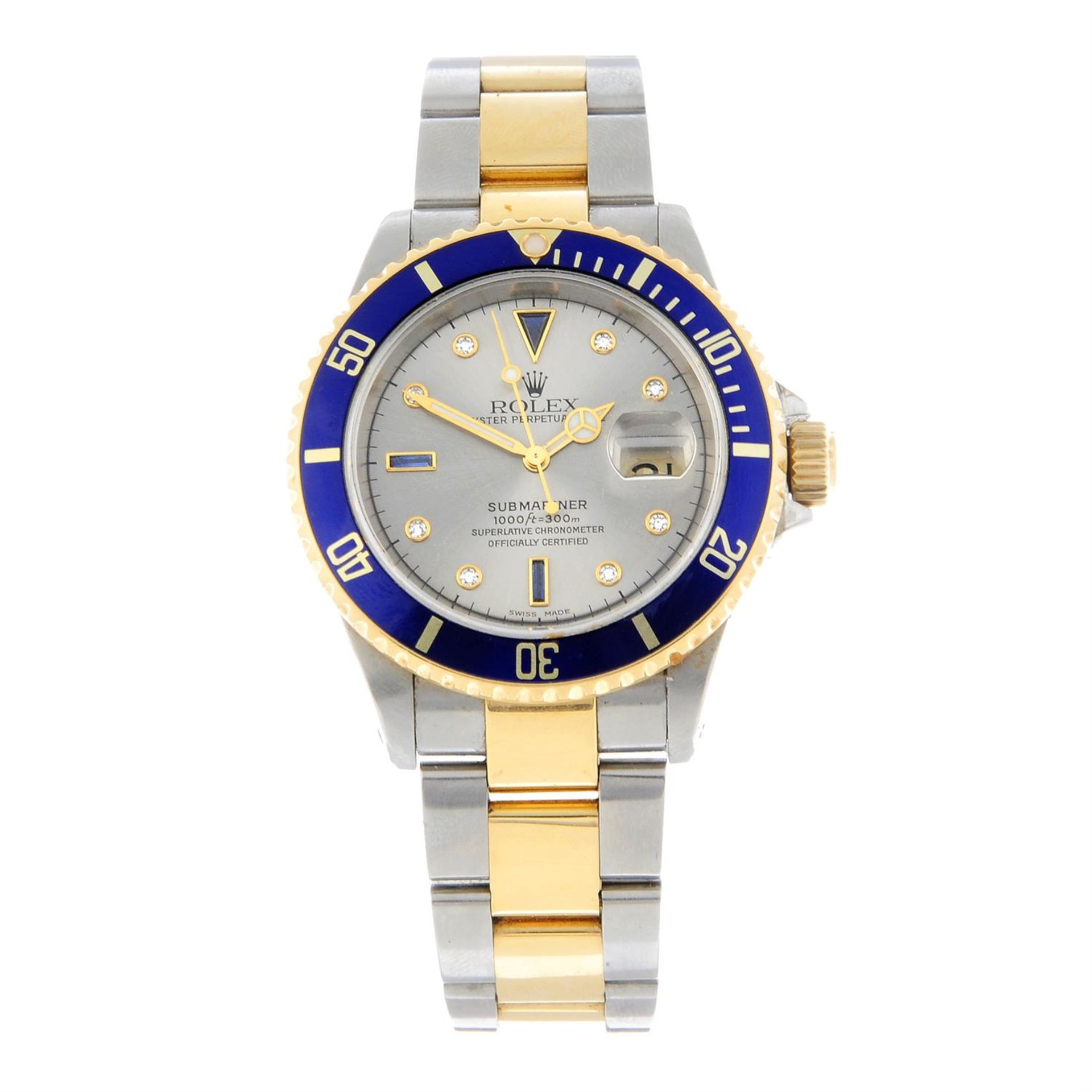 ROLEX - a bi-metal Oyster Perpetual Submariner bracelet watch, 39mm.