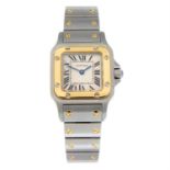 CARTIER - a bi-metal Santos bracelet watch, 23x24mm.