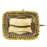 A mid 19th century 9ct gold citrine brooch.