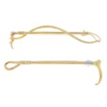 Two mid 20th century 9ct gold riding crop brooches.