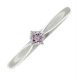 A platinum 'pink' diamond single-stone ring.