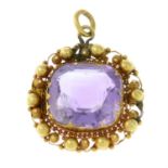 An mid 19th century 18ct gold amethyst cannetille pendant.