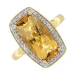 A 9ct gold citrine and pave-set diamond cluster ring.