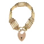 A mid 20th century 9ct gold gate-link bracelet, with heart-shaped padlock clasp.