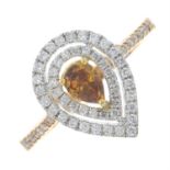 An 18ct gold 'brownish-orange' diamond and diamond cluster ring.