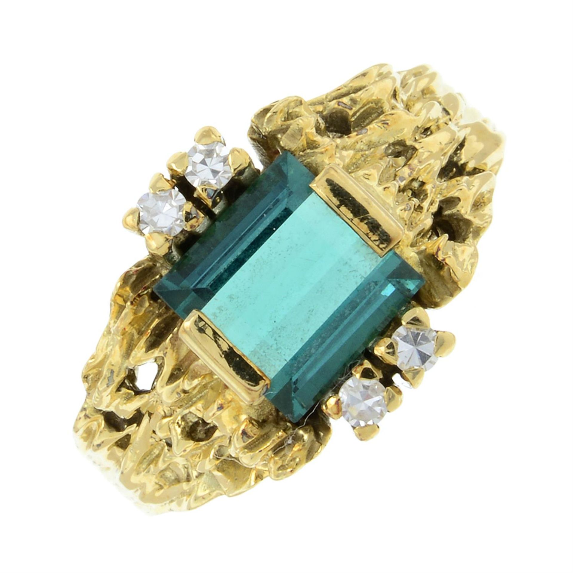 A tourmaline and diamond textured ring.