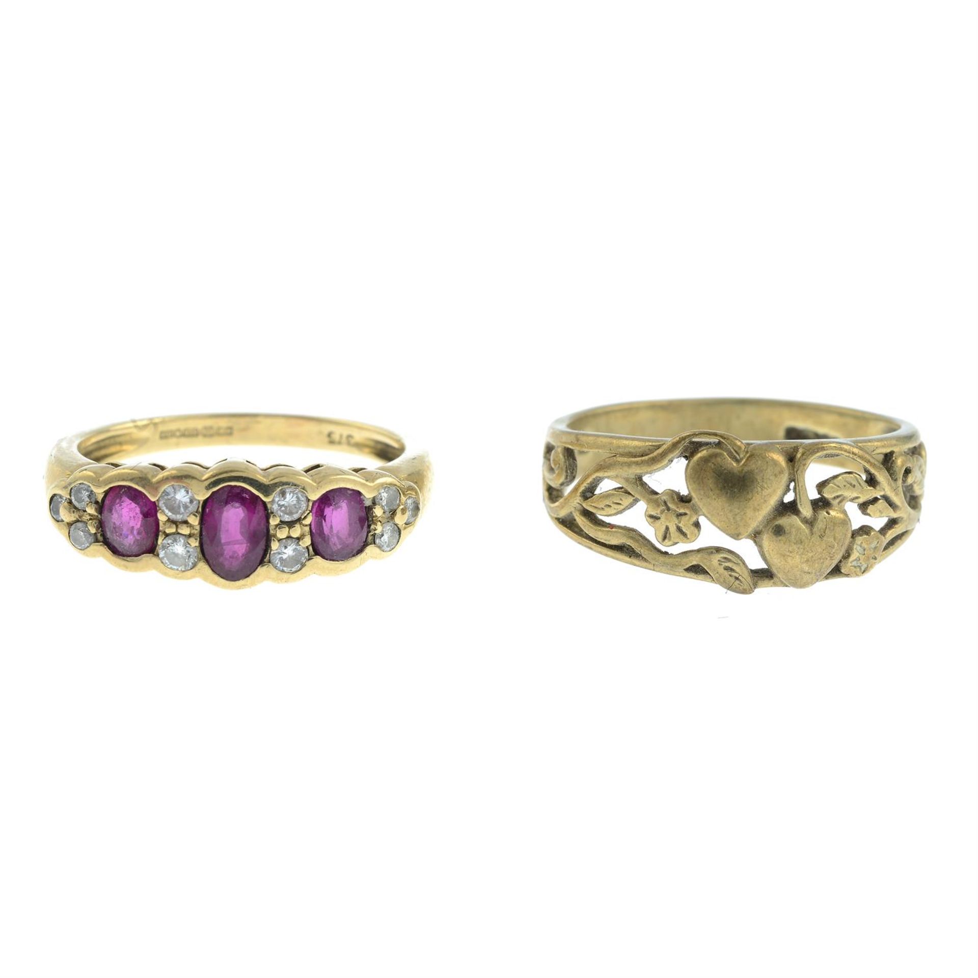 A 9ct gold ruby three-stone ring, with diamond spacers, together with a 9ct gold floral openwork