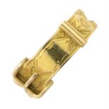 A mid Victorian 15ct gold memorial ring, depicting a belt and buckle, with woven hairwork to the