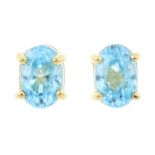 A pair of blue zircon stud earrings.
