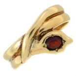 A 9ct gold snake ring, with garnet accent.