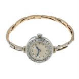 A lady's mid 20th century old-cut diamond cocktail watch, with expandable bracelet.