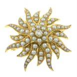 An early 20th century gold split pearl and diamond stylised floral brooch.