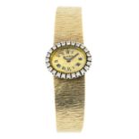 A lady's 9ct gold diamond cocktail watch.